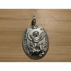 Rebecca Collin’s Cherub/Angel Silver Tone Pendant Signed. Newman Marcus